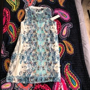 white dress with patterned mesh